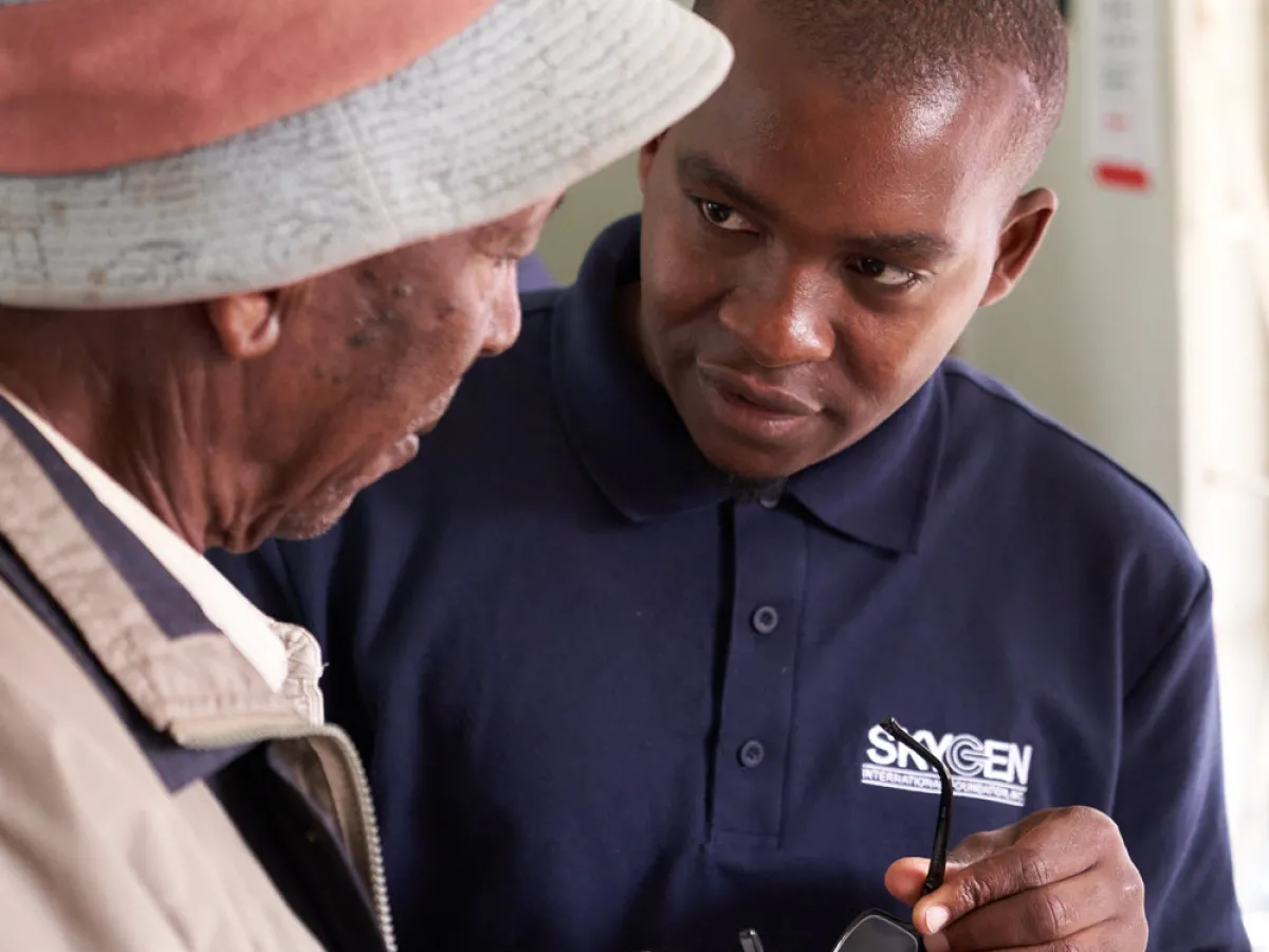 Local Team Member Helping With New Glasses